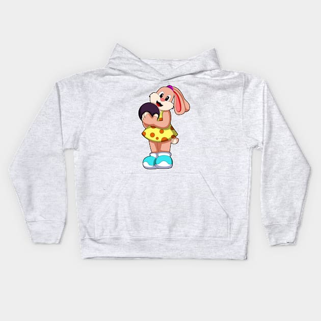 Rabbit at Bowling with Bowling ball Kids Hoodie by Markus Schnabel